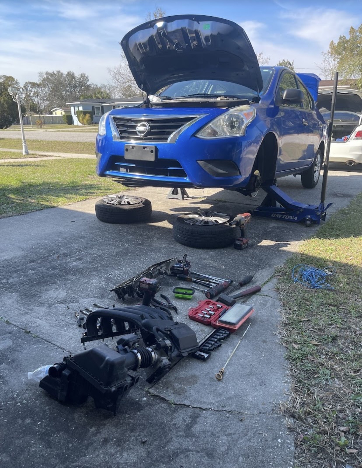 Intake manifold & tire service — Nissan Versa